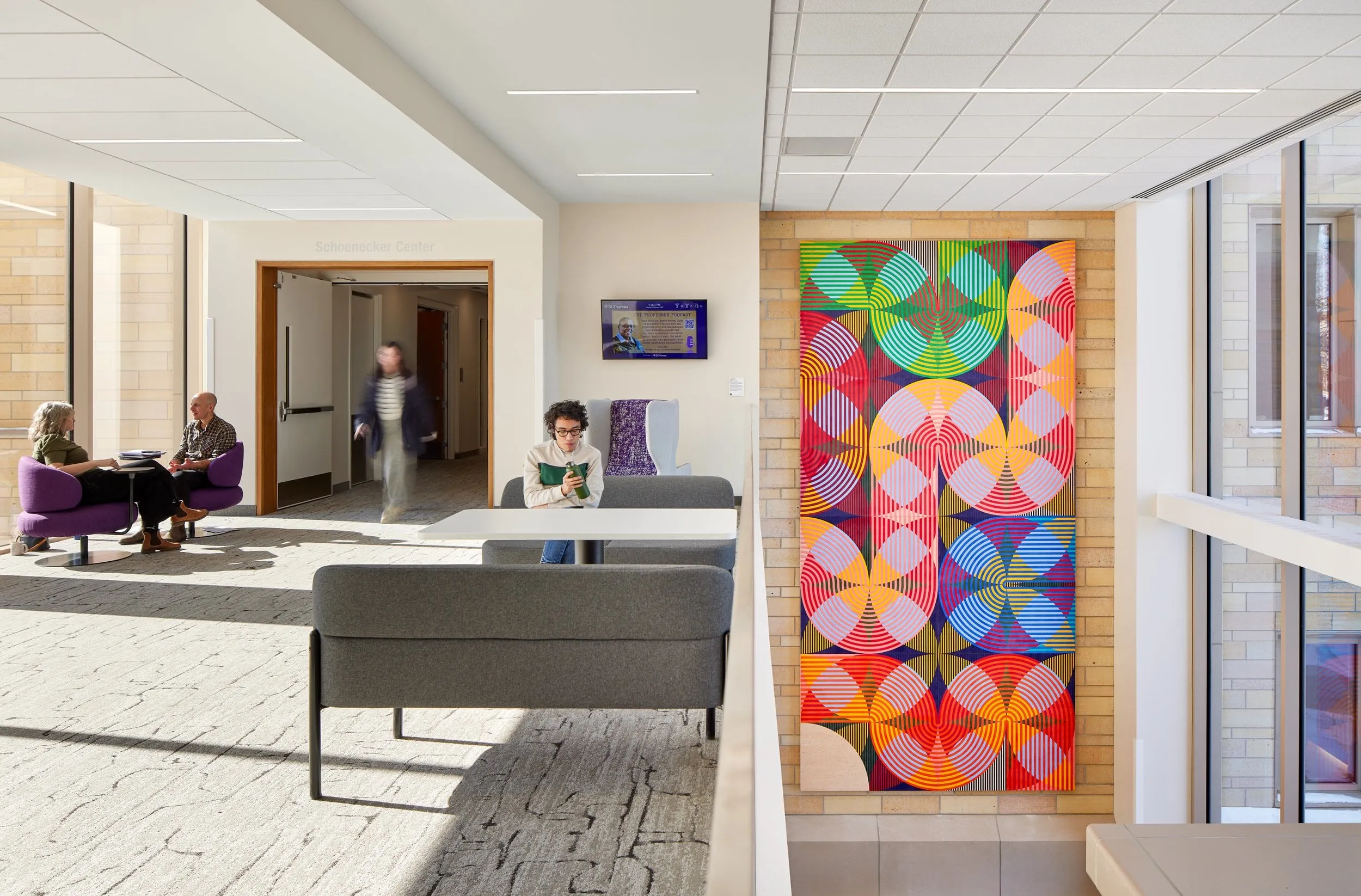 Geometrical art hanging on a wall from upstairs